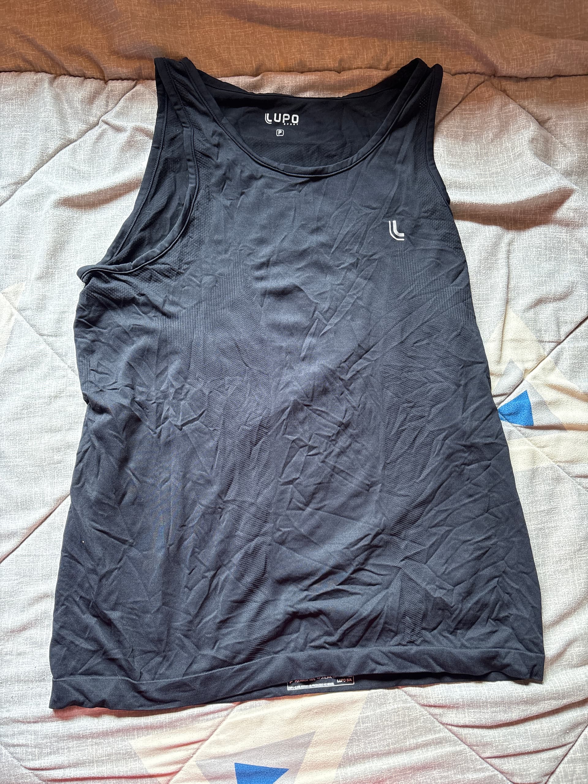 Photo by https://trato-hecho.nyc3.digitaloceanspaces.com/nextImages/(1)-camisilla-lupo-image.jpg