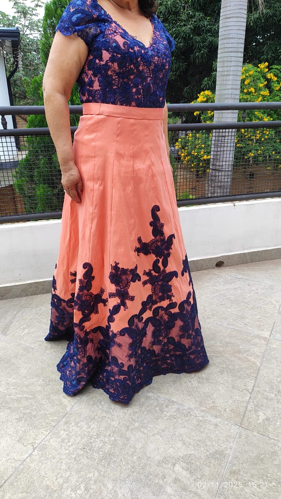 Photo by https://trato-hecho.nyc3.digitaloceanspaces.com/nextImages/(1)-vestido-elegante-1-naranja.jpeg